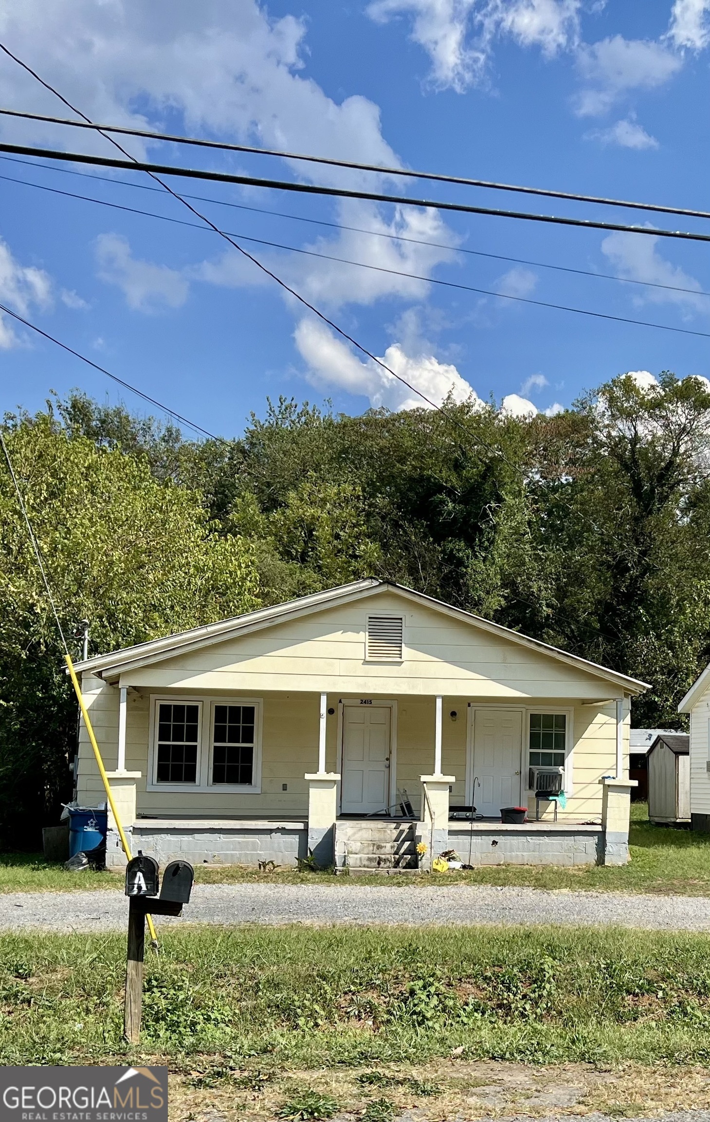 2415 Maple Road Southeast Rome, GA 30161 - Photo 1 of 1 a front view of a house with garden