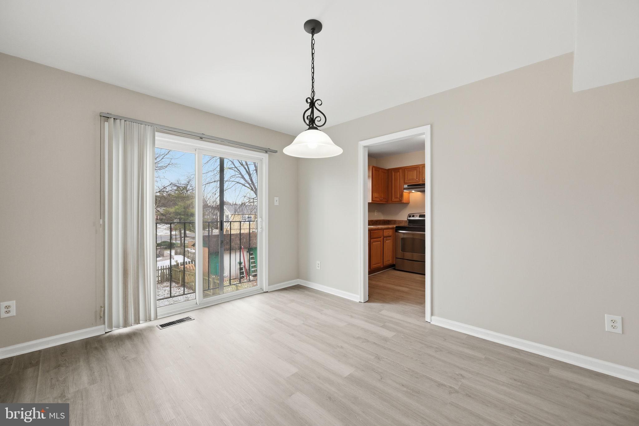 16 South Pendleton Court Frederick, MD 21703 - Photo 8 of 26 Dining room with Patio
