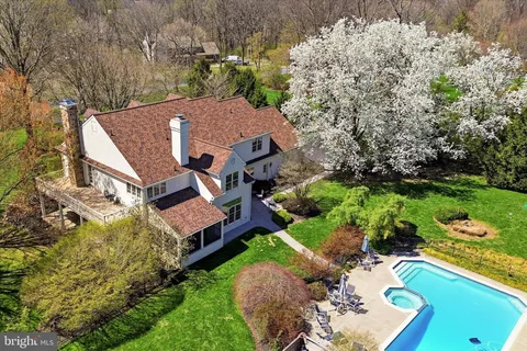 an aerial view of a house with a garden