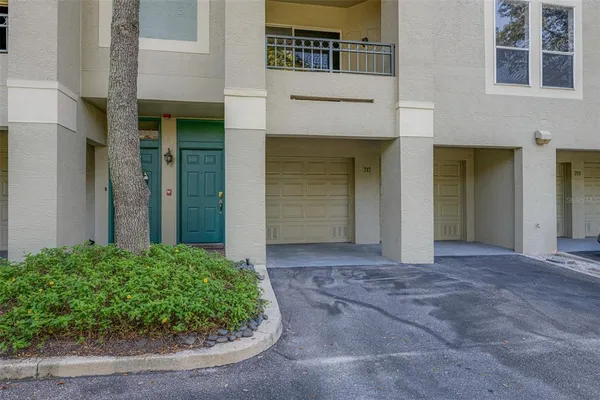 a view of a house with entrance gate