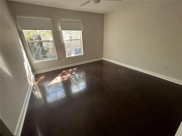 a view of an empty room and window