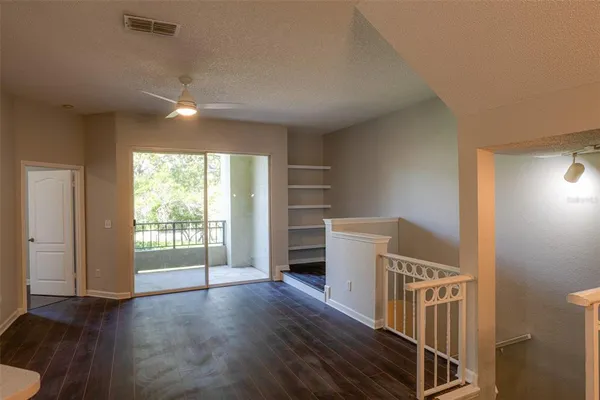 a view of livingroom with furniture and wooden floor