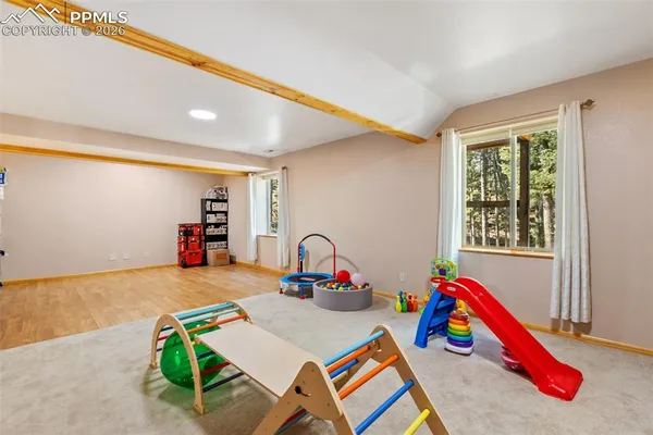 a room with furniture and a wooden floor