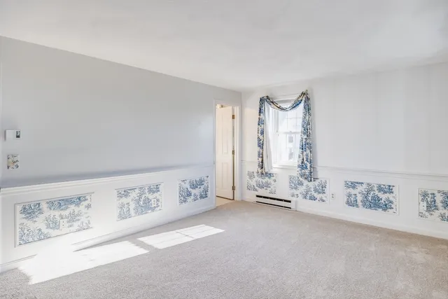 a view of an empty room with window