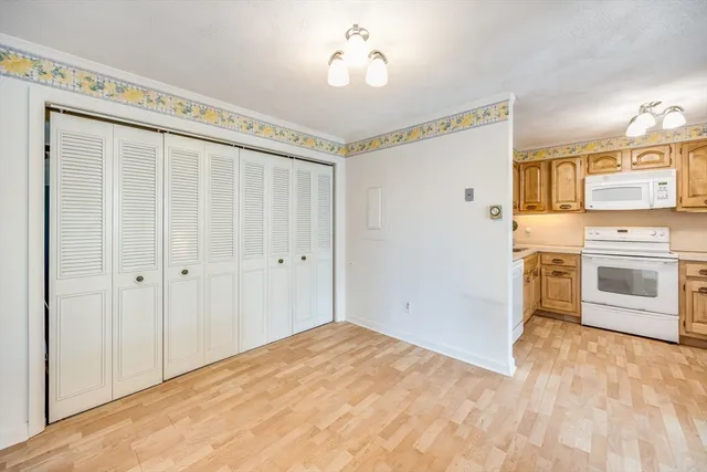 a view of a kitchen with a sink cabinets and a window