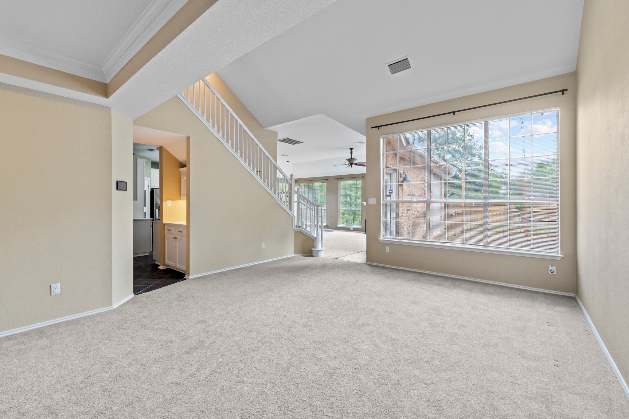 8605 Axis Drive Austin, TX 78749 - Photo 5 of 38 A spacious living area with soaring ceilings and abundant natural light.