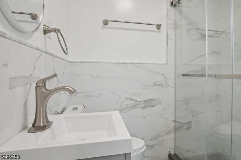 19 Ashwood Avenue, Unit 1 Summit, NJ 07901 - Photo 13 of 17 a bathroom with a sink