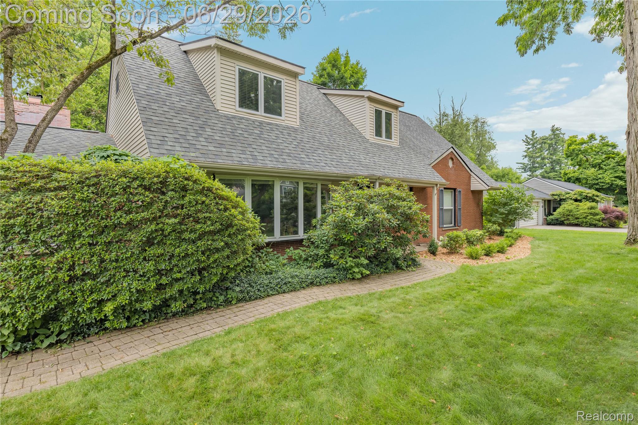 6085 Worlington Road Bloomfield Hills, MI 48301 - Photo 7 of 75 Brick and siding exterior with a dark shingle roof