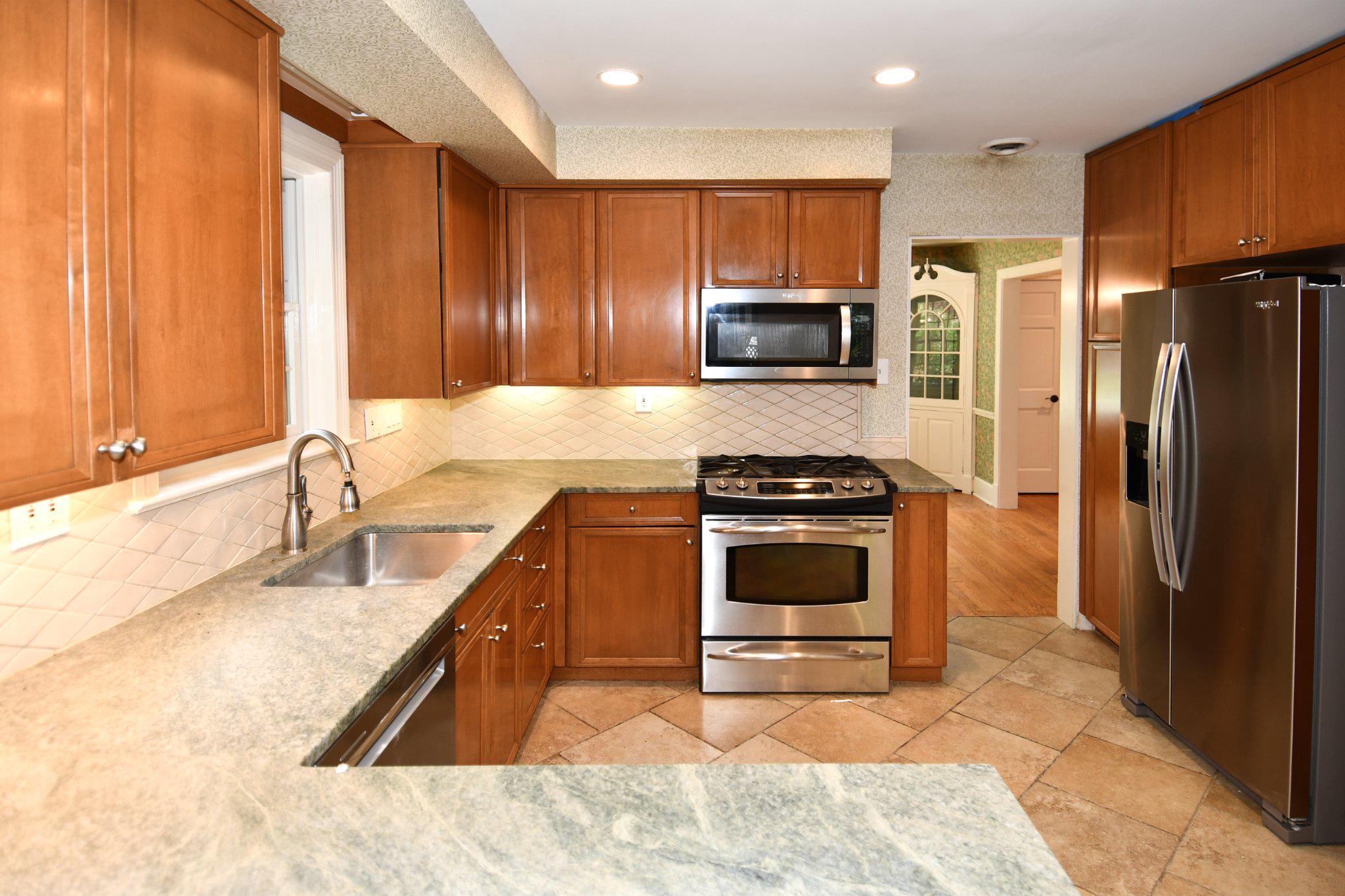 2608 Fordham Road Alexandria, VA 22302 - Photo 13 of 46 Modern kitchen with warm wood tones.