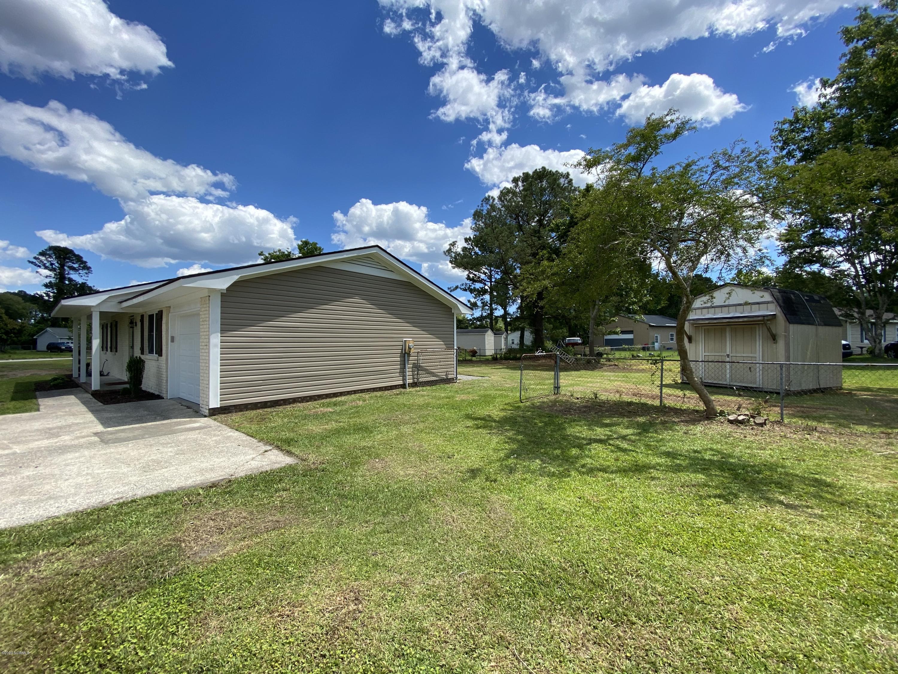 138 Bayberry Road Newport, NC 28570 - Photo 17 of 70 Backyard fence with double gates at entrance is always a bonus!
