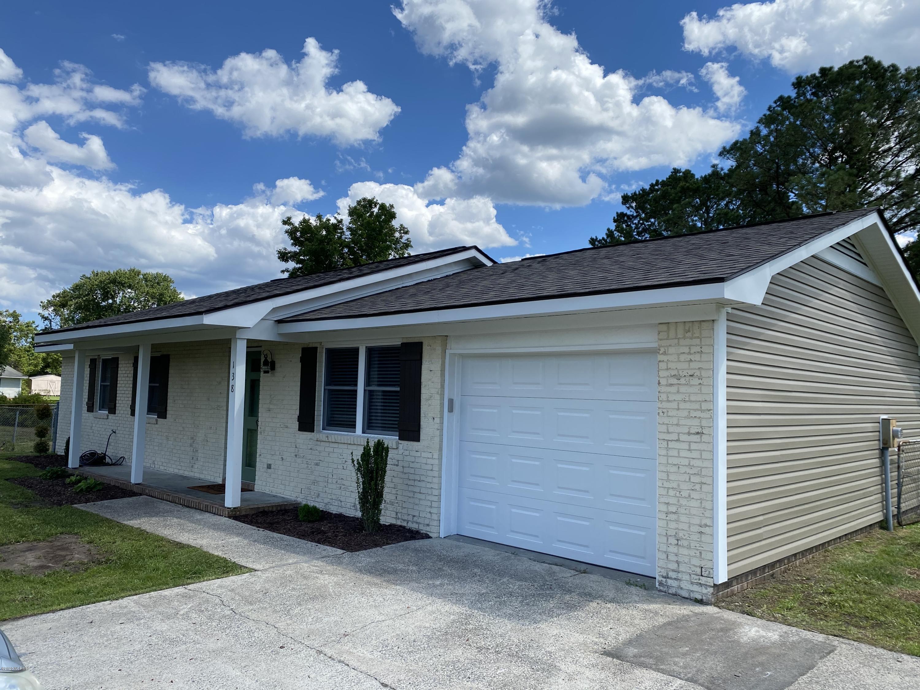 138 Bayberry Road Newport, NC 28570 - Photo 4 of 70 Right side of house and great view of the new roof and new vinyl siding on sides (and back of house).