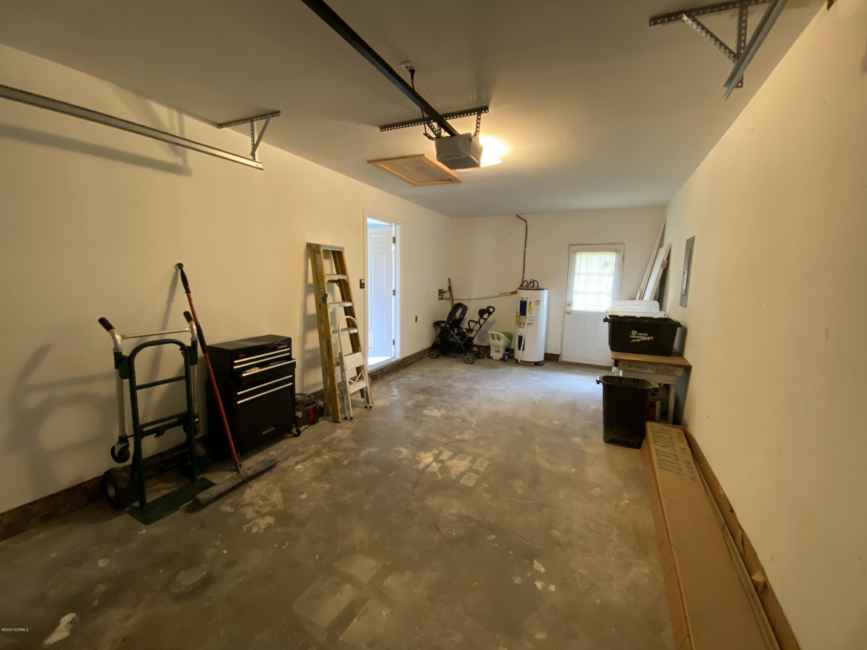 138 Bayberry Road Newport, NC 28570 - Photo 65 of 70 Washer and Dryer Hookups are located towards the back of the garage!