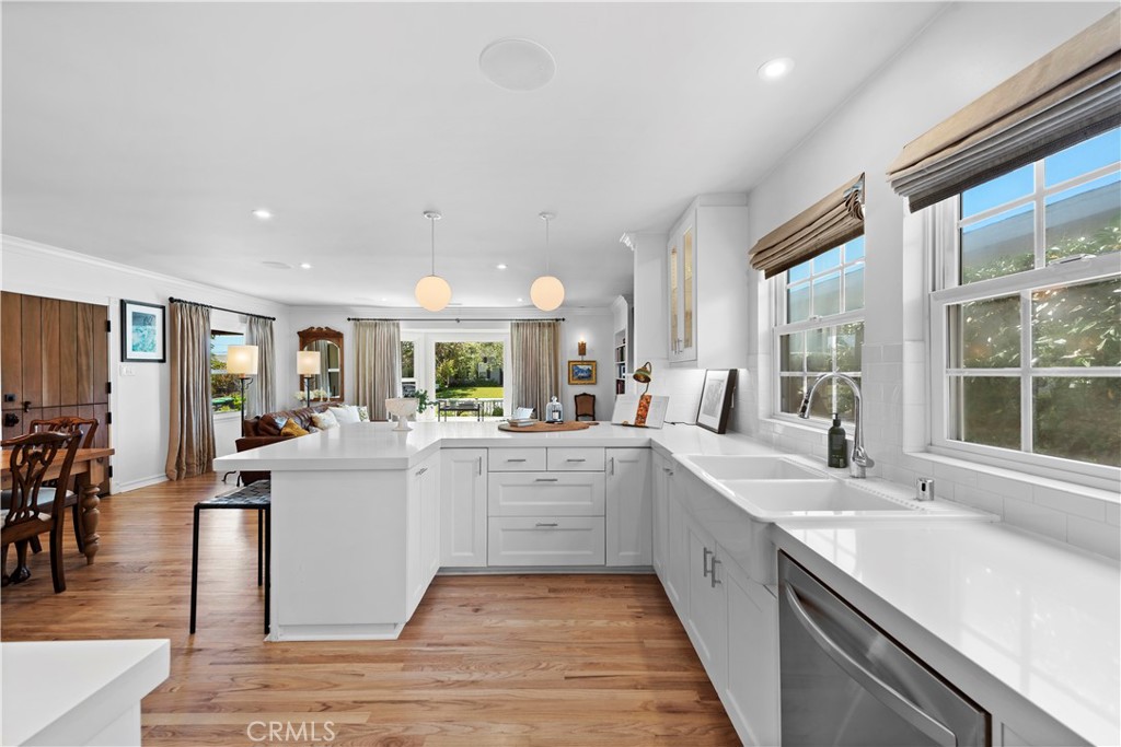 320 Broadway Costa Mesa, CA 92627 - Photo 22 of 43 a large white kitchen with lots of counter top space