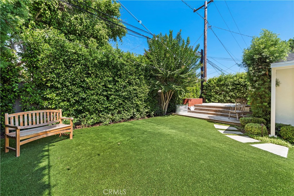 320 Broadway Costa Mesa, CA 92627 - Photo 28 of 43 a garden with wooden fence