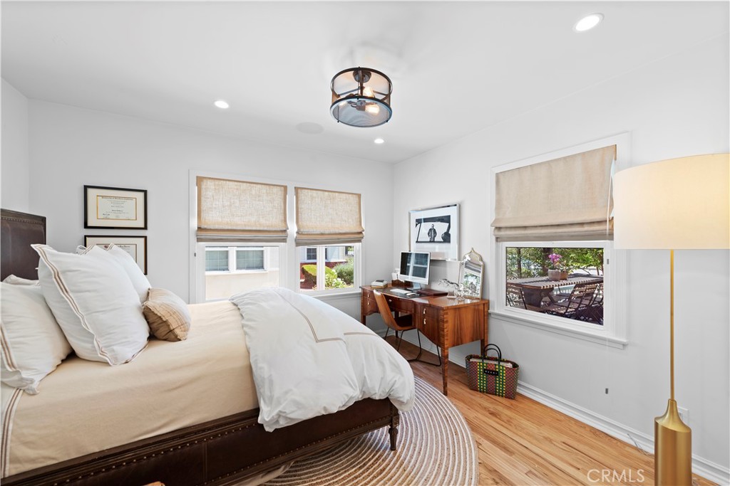 320 Broadway Costa Mesa, CA 92627 - Photo 36 of 43 a bedroom with a bed furniture and a window