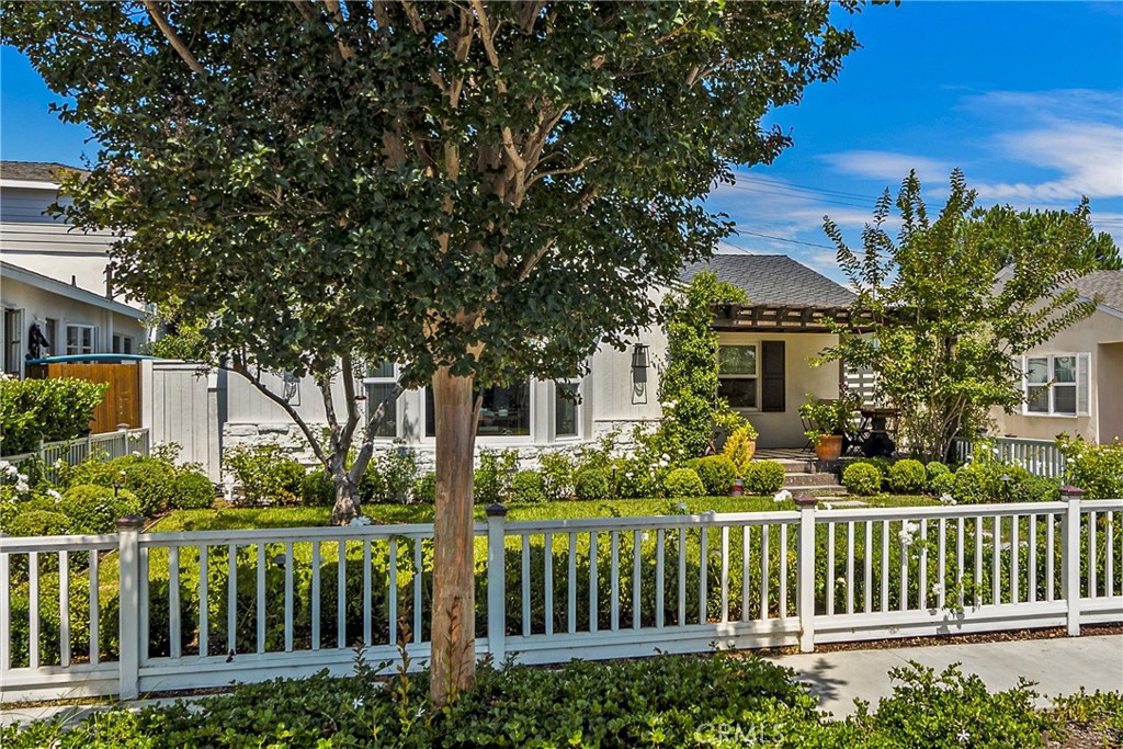 320 Broadway Costa Mesa, CA 92627 - Photo 4 of 43 a front view of a house with a garden