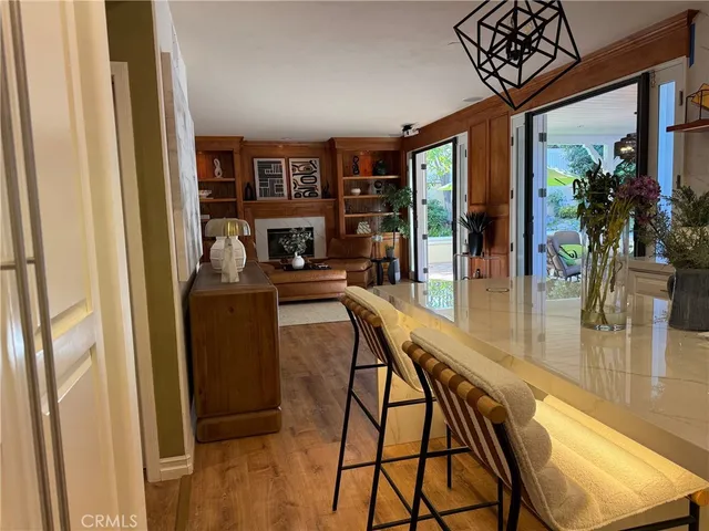 a view of a backyard with sitting area