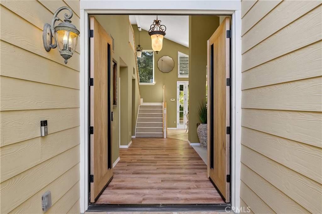 24587 Lola Lane Newhall, CA 91321 - Photo 5 of 44 a view of a entryway door of the house