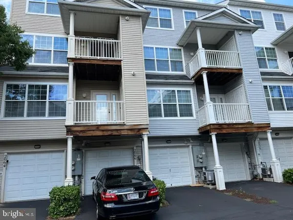 a car parked in front of a building