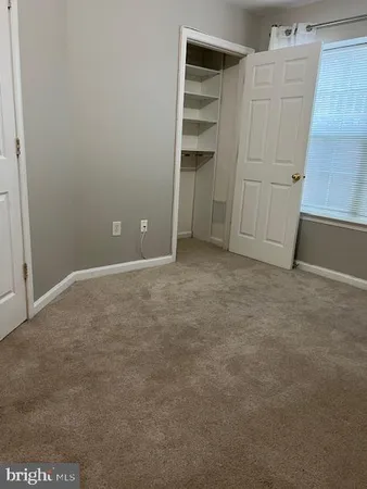 an empty room with closet