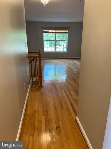 a view of entryway with wooden floor
