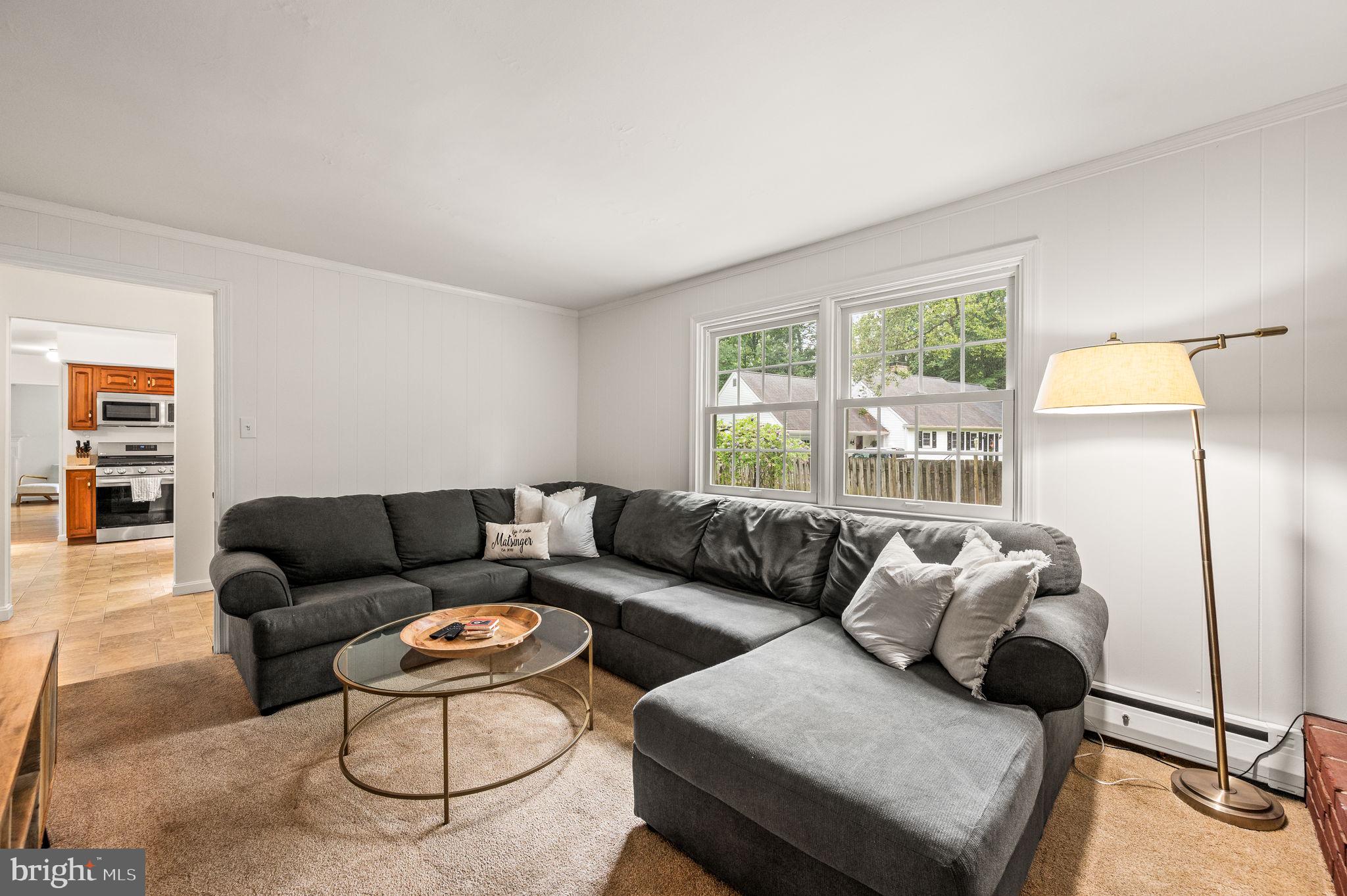 201 Morris Road Exton, PA 19341 - Photo 14 of 33 a living room with furniture and a large window