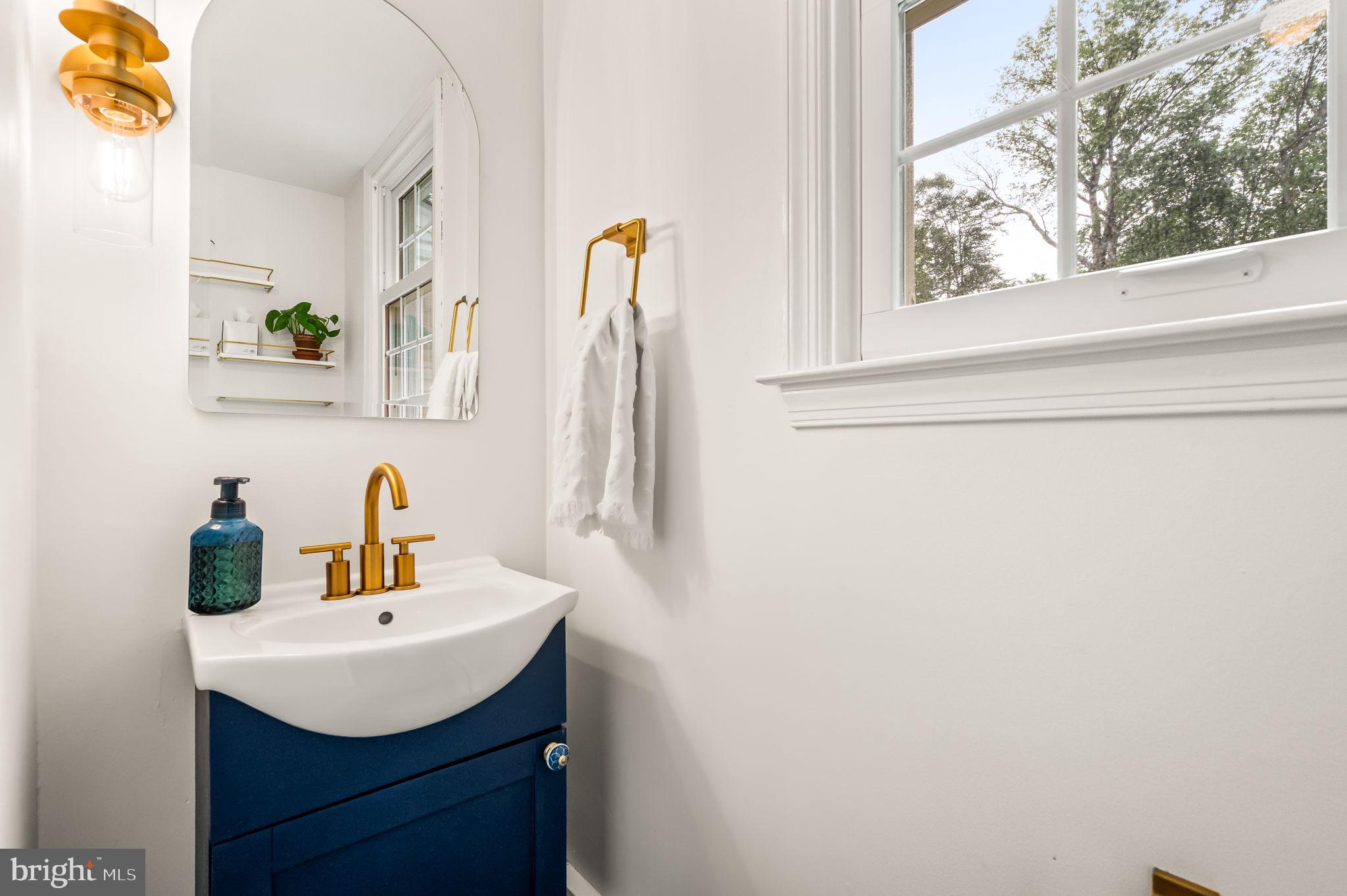 201 Morris Road Exton, PA 19341 - Photo 15 of 33 a bathroom with a sink vanity and a mirror