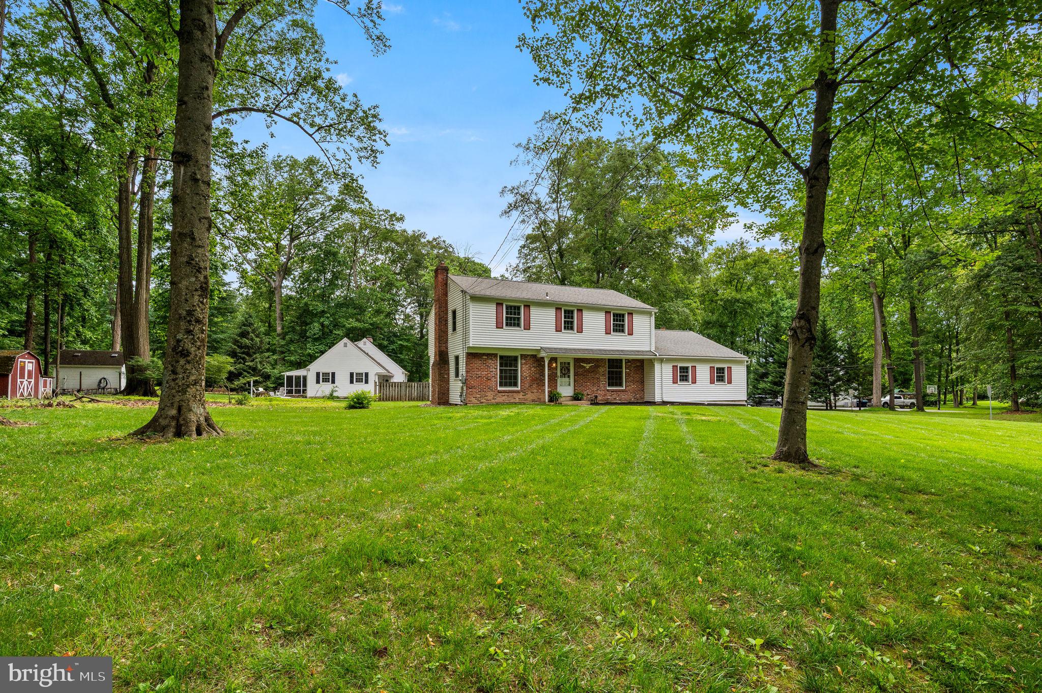 201 Morris Road Exton, PA 19341 - Photo 2 of 33 a house with green field in front of it