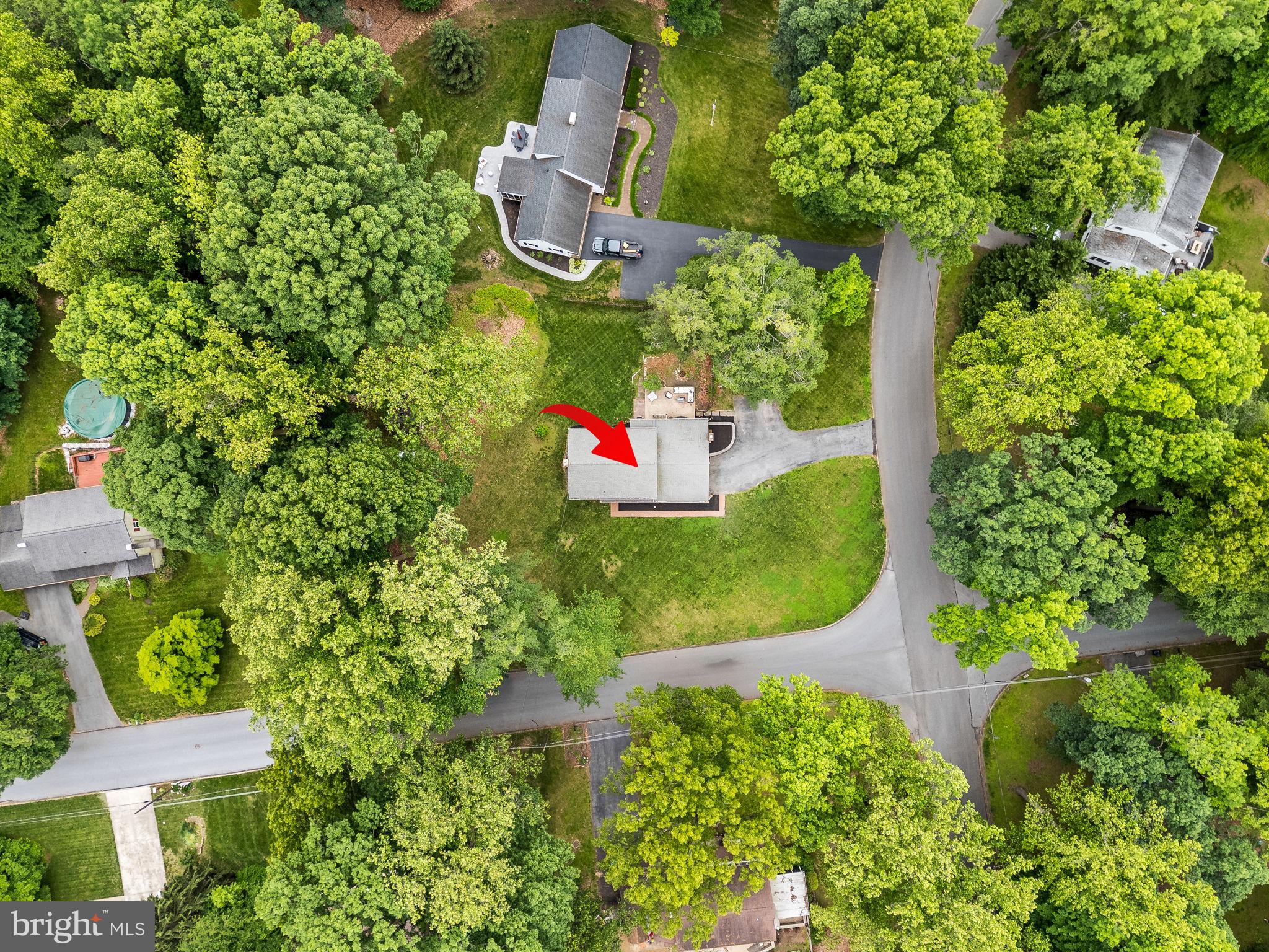 201 Morris Road Exton, PA 19341 - Photo 31 of 33 an aerial view of a house with a yard and large trees