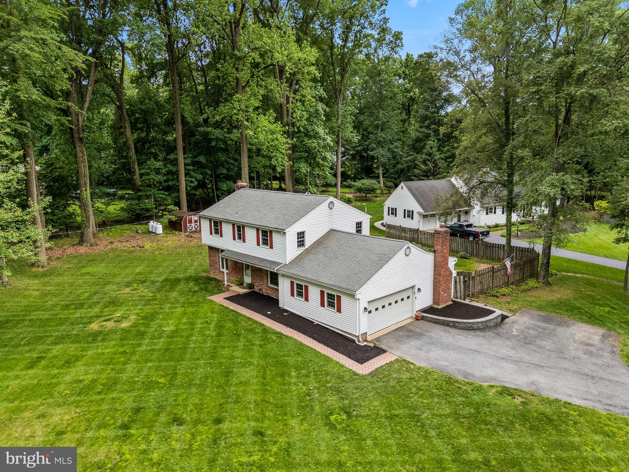 201 Morris Road Exton, PA 19341 - Photo 4 of 33 an aerial view of a house with swimming pool and sitting area