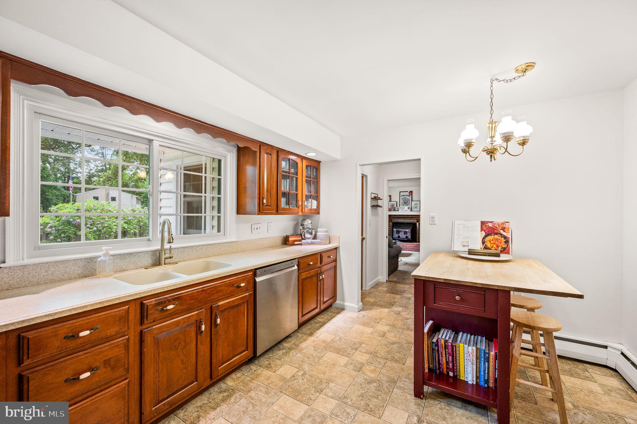 201 Morris Road Exton, PA 19341 - Photo 10 of 33 a spacious bathroom with a sink and a large mirror