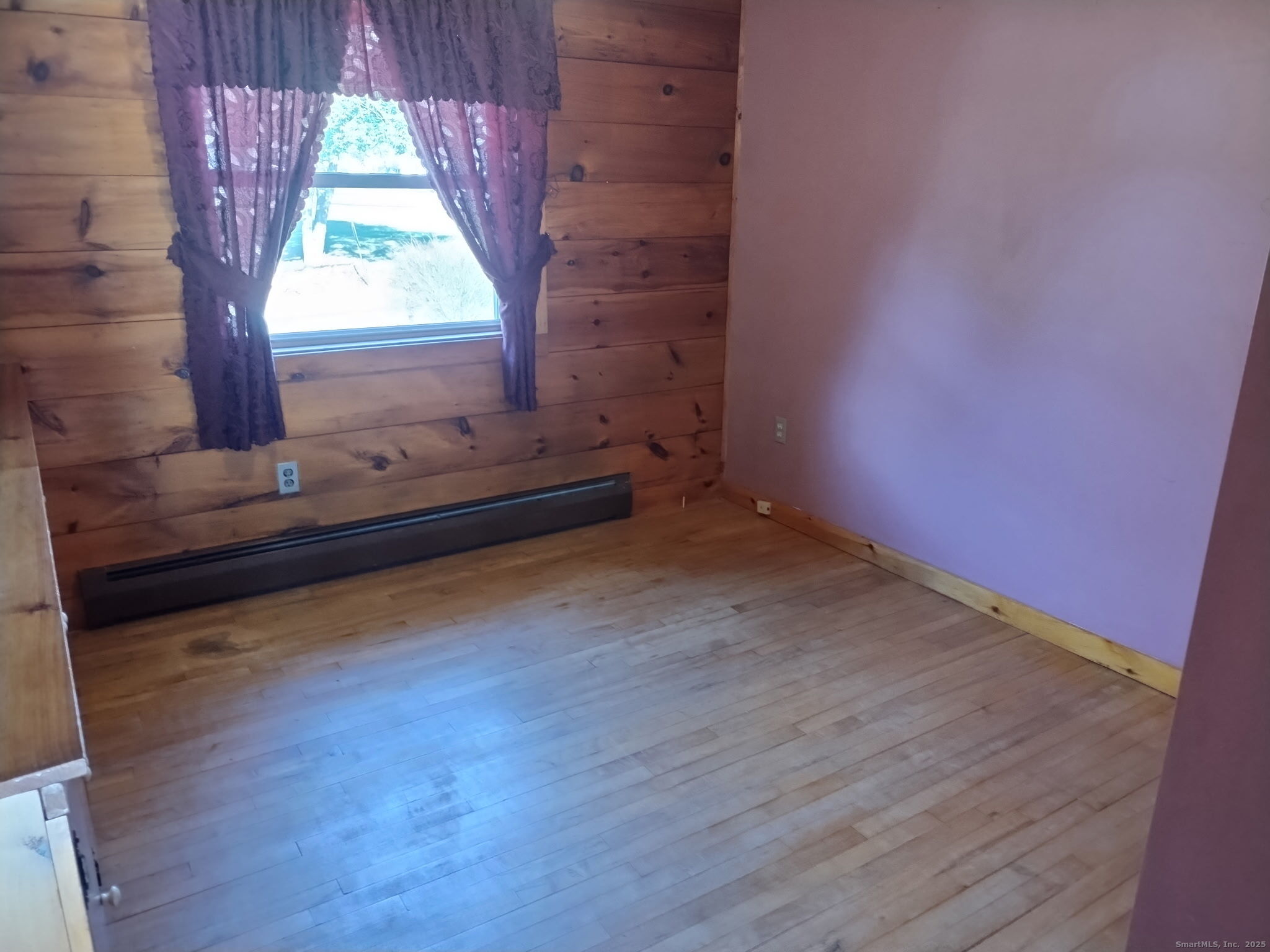 30 Lyon Road Woodstock, CT 06282 - Photo 15 of 19 a view of a room with wooden floor and a window