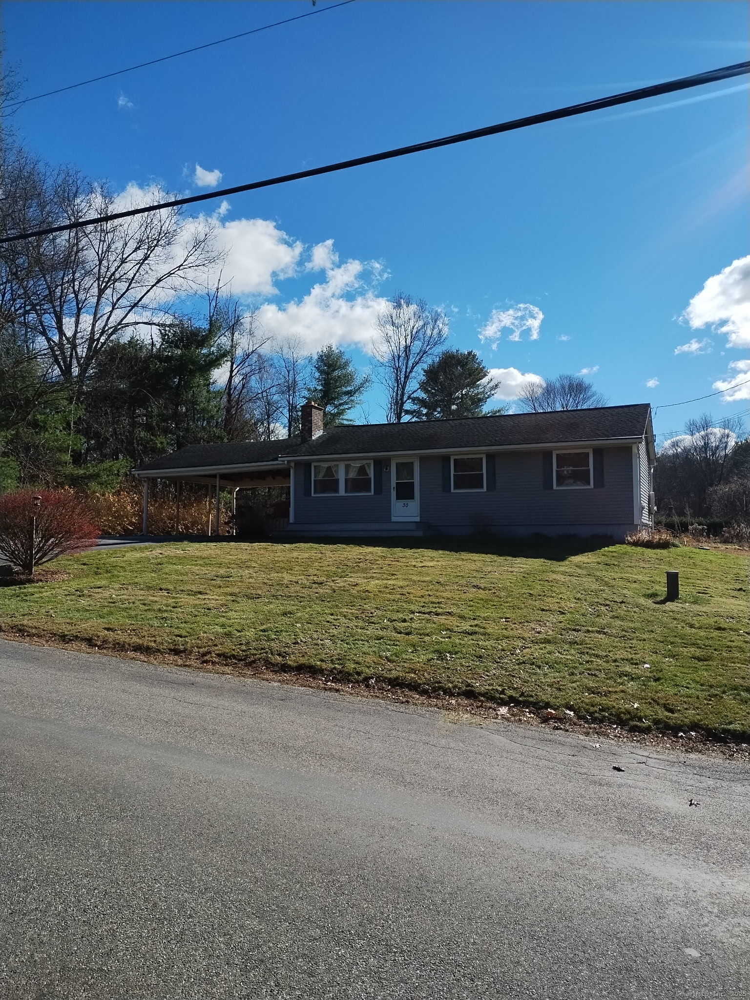 30 Lyon Road Woodstock, CT 06282 - Photo 18 of 19 a front view of a house with a yard