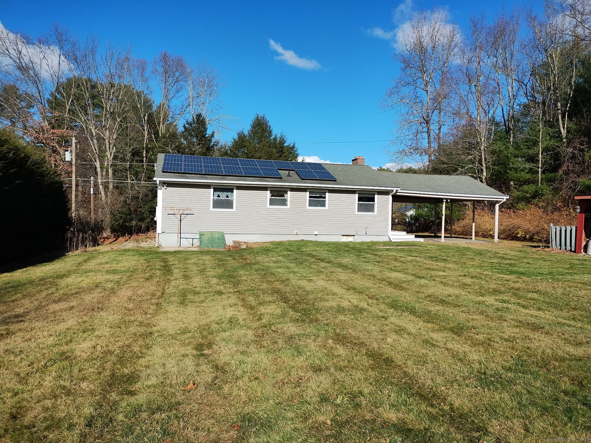 30 Lyon Road Woodstock, CT 06282 - Photo 2 of 19 a front view of a house with a garden