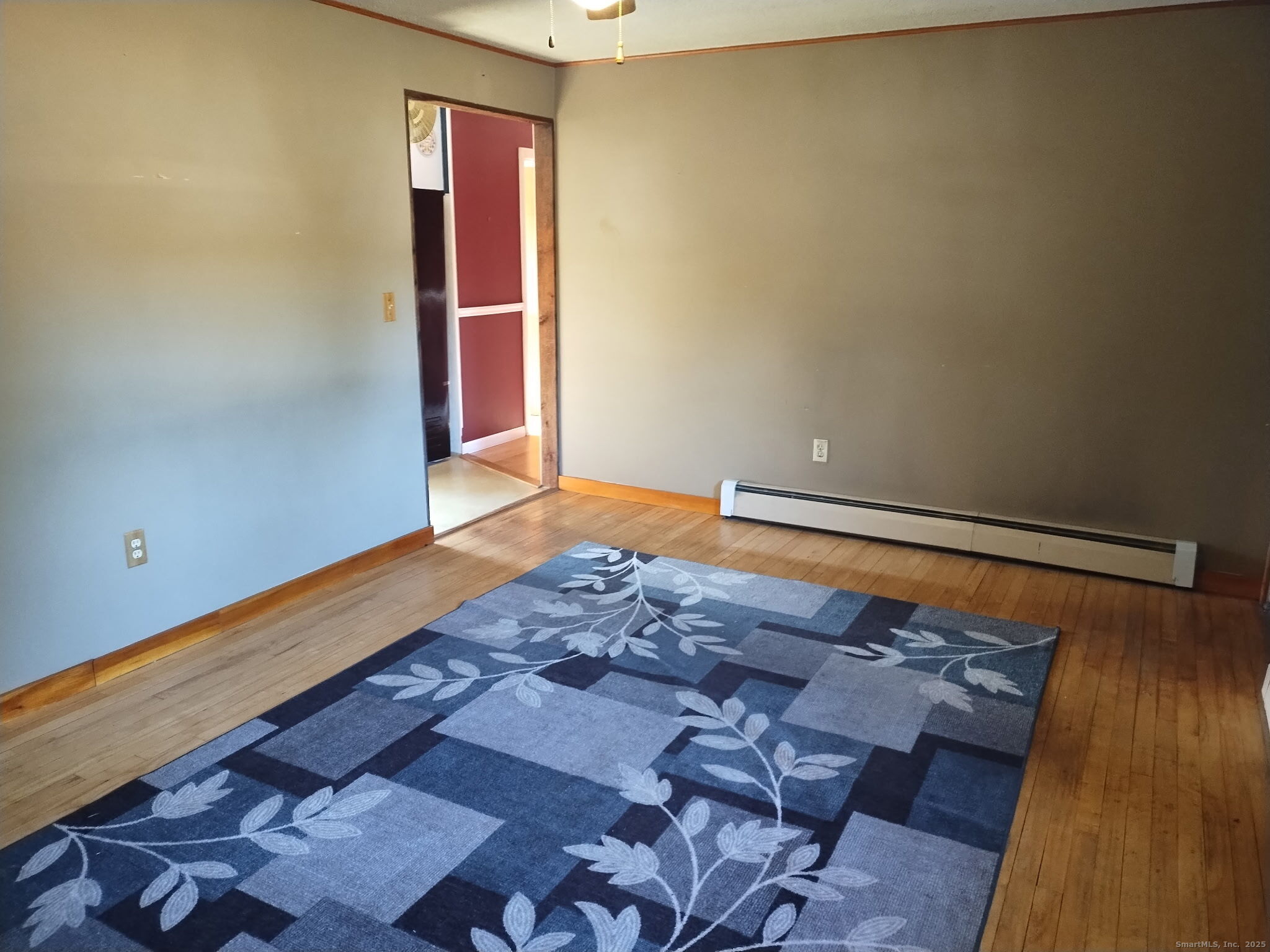 30 Lyon Road Woodstock, CT 06282 - Photo 10 of 19 a view of room with wooden floor