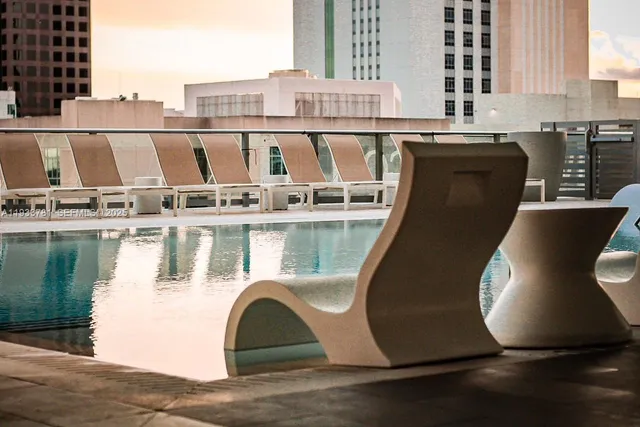 a view of a balcony with chairs
