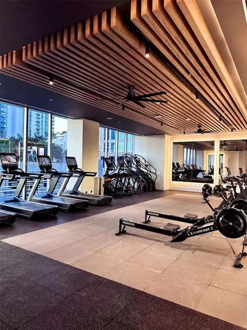 a view of a room with gym equipment