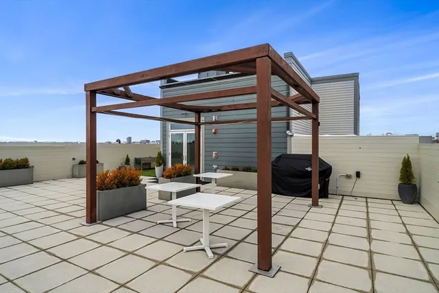 a view of balcony with furniture