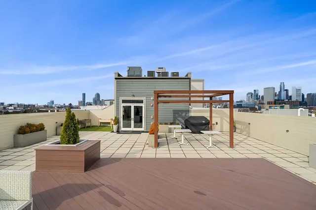 a view of a terrace with seating space