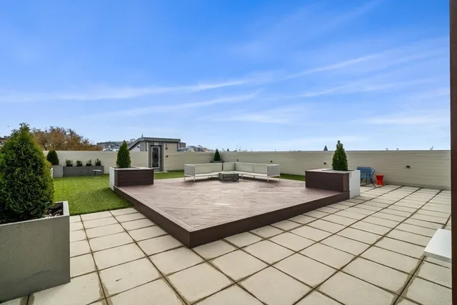 a terrace view with two chairs