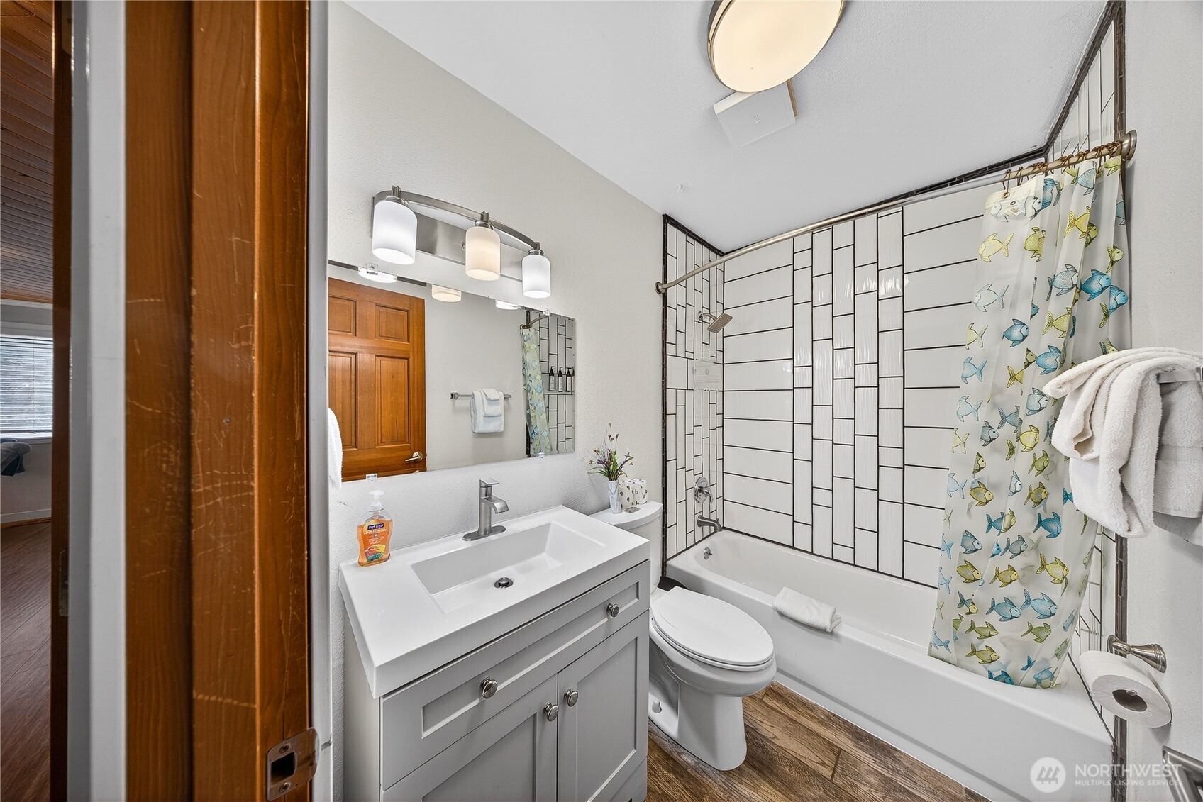 5972 Hastings Road Clinton, WA 98236 - Photo 20 of 40 a bathroom with a sink toilet and shower