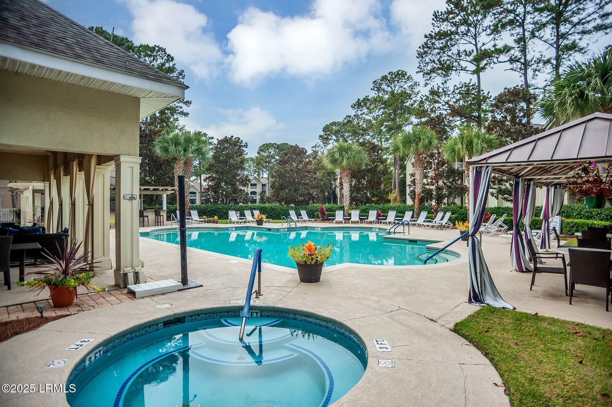 380 Marshland Road, Unit E26 Hilton Head Island, SC 29926 - Photo 26 of 32 Hot tub