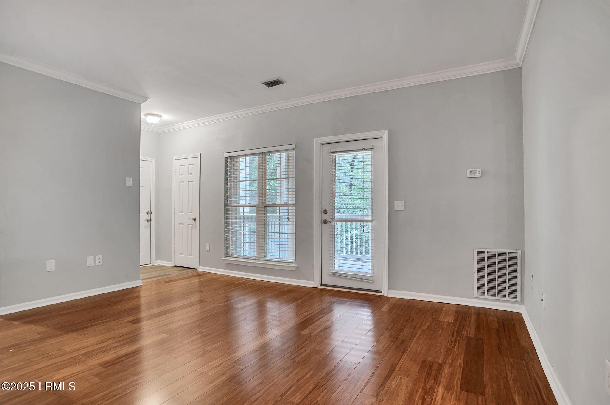380 Marshland Road, Unit E26 Hilton Head Island, SC 29926 - Photo 7 of 32 Family Room to Balcony