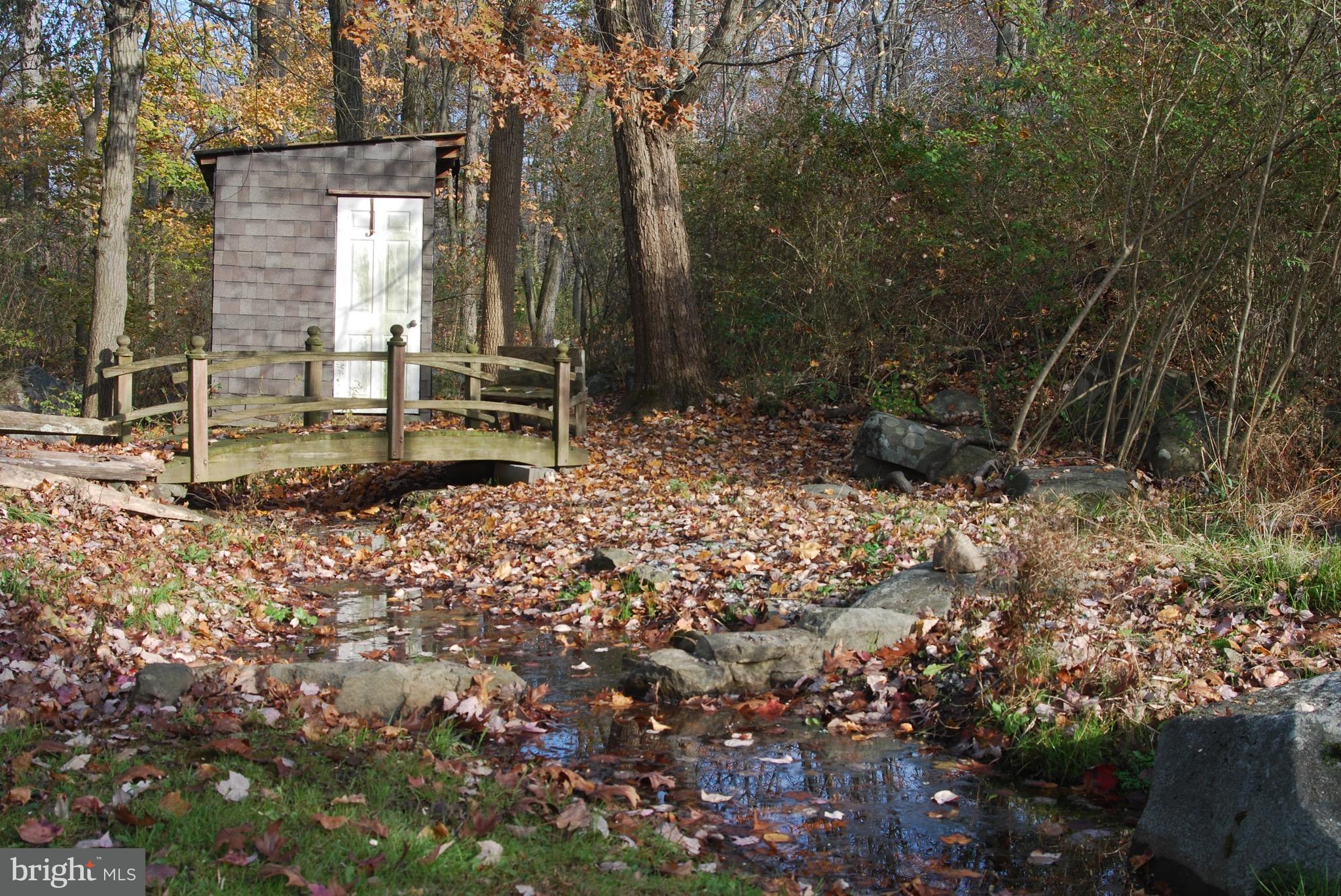314 Decatur Street Elizabethtown, PA 17022 - Photo 23 of 24 Back Lot with stream, bridge and shed