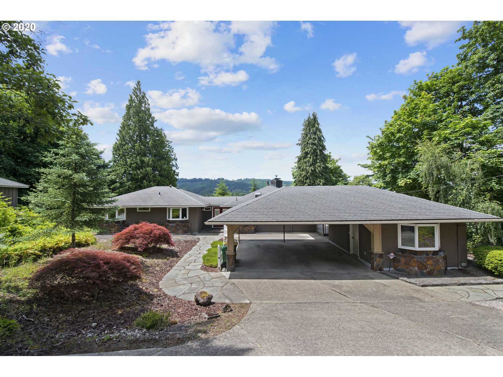 16245 Northwest McNamee Road Portland, OR 97231 - Photo 1 of 32 a view of a house with a yard