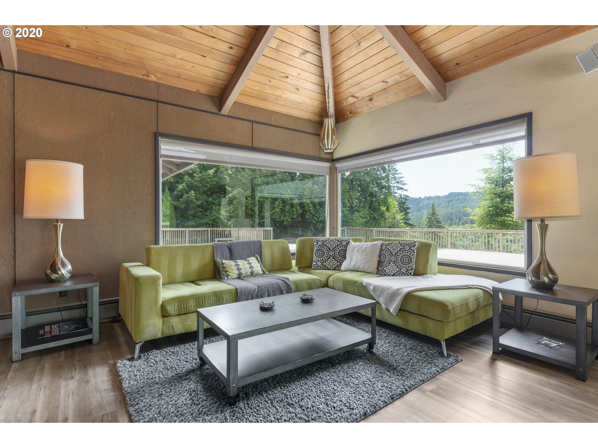 16245 Northwest McNamee Road Portland, OR 97231 - Photo 16 of 32 a living room with furniture and a large window