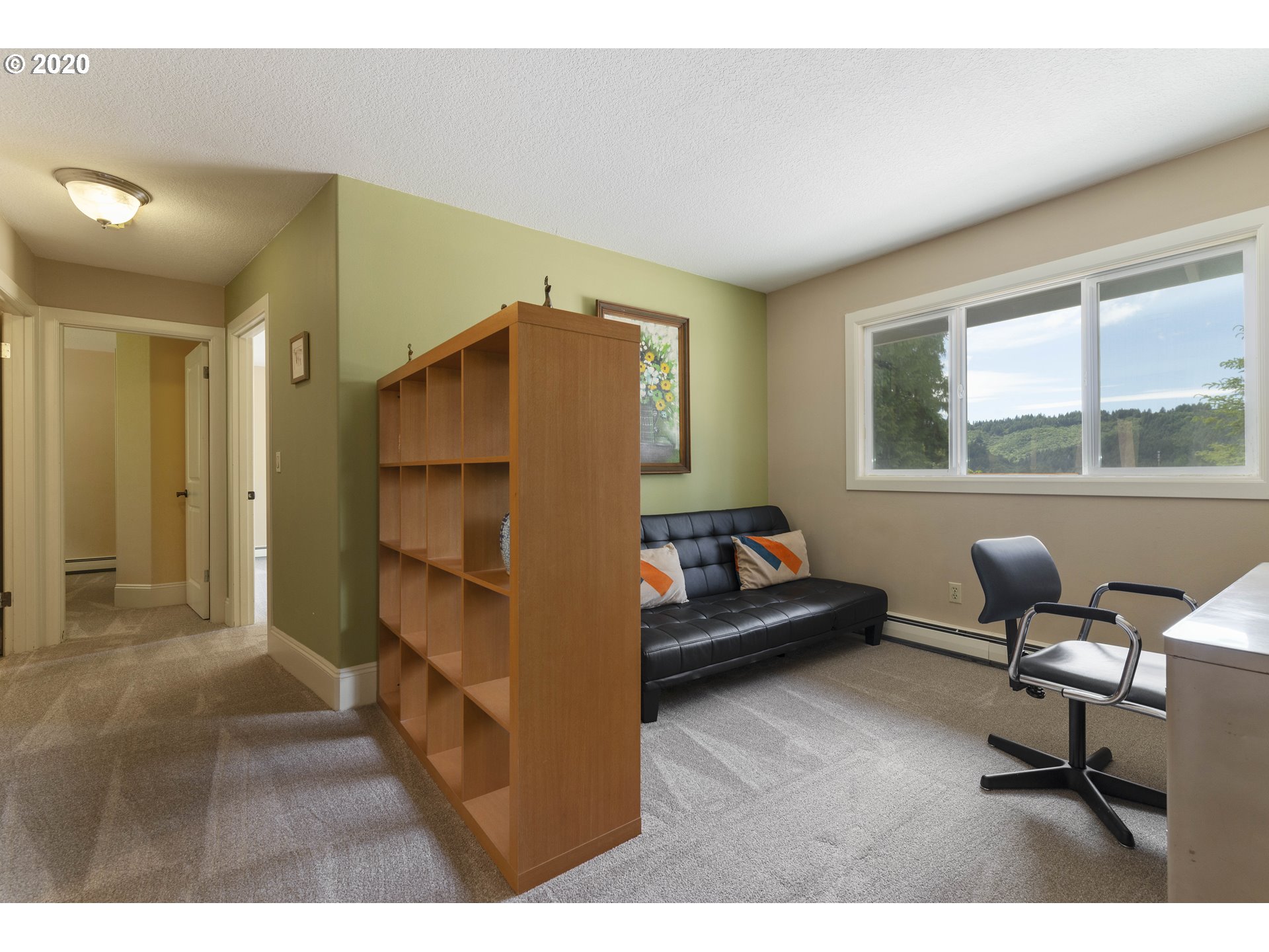 16245 Northwest McNamee Road Portland, OR 97231 - Photo 18 of 32 a living room with furniture and a window