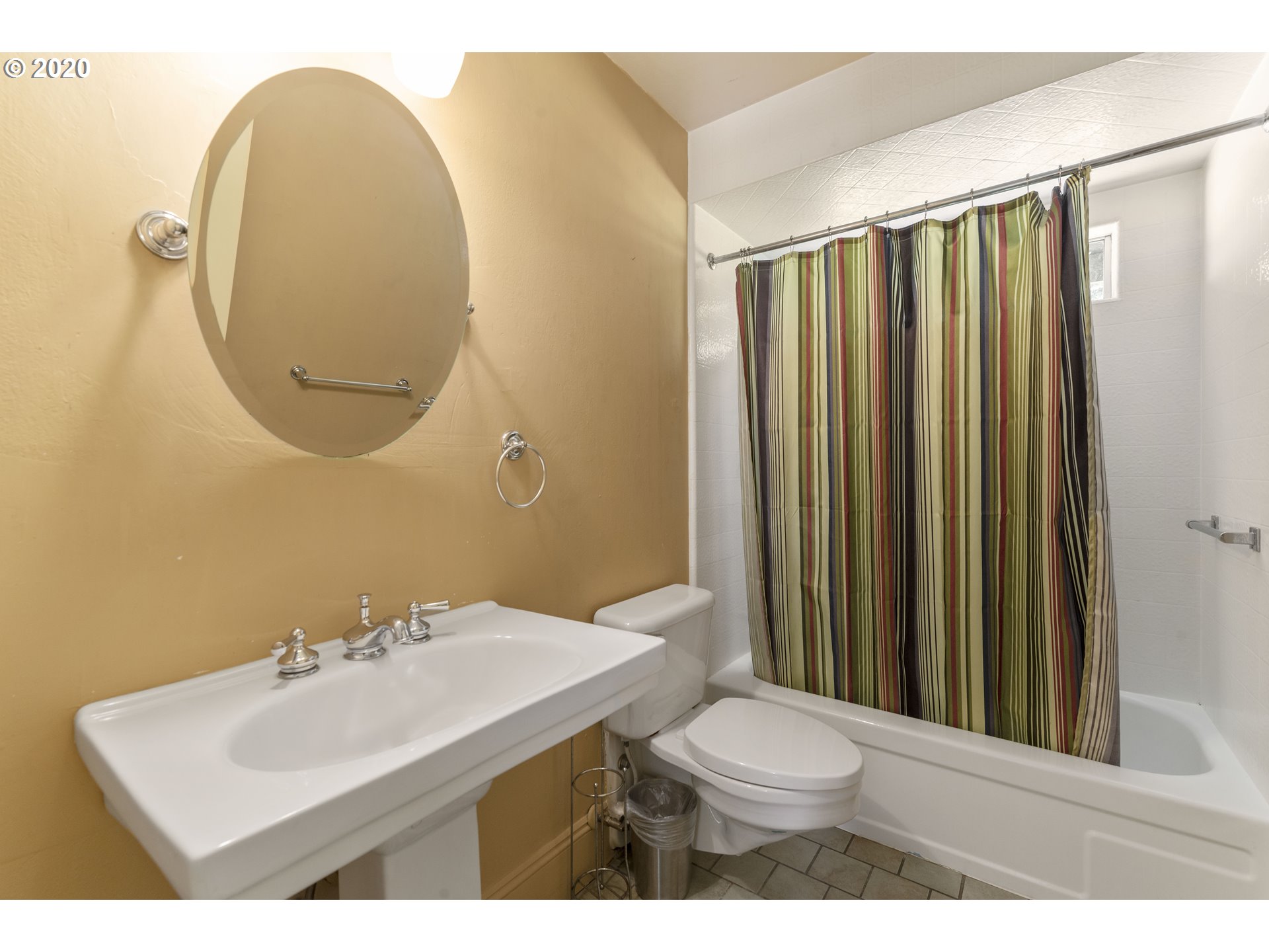 16245 Northwest McNamee Road Portland, OR 97231 - Photo 21 of 32 a bathroom with a toilet a sink and mirror
