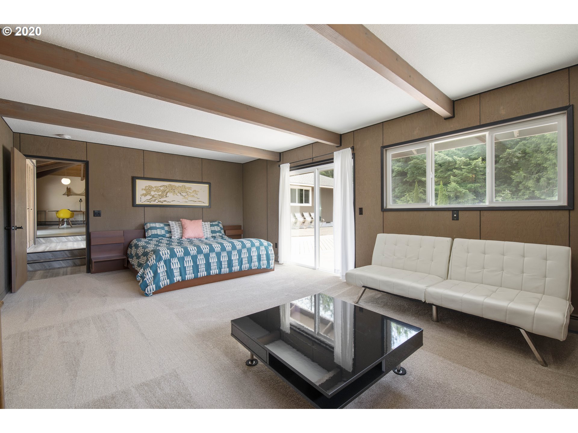 16245 Northwest McNamee Road Portland, OR 97231 - Photo 26 of 32 a living room with furniture and a night stand