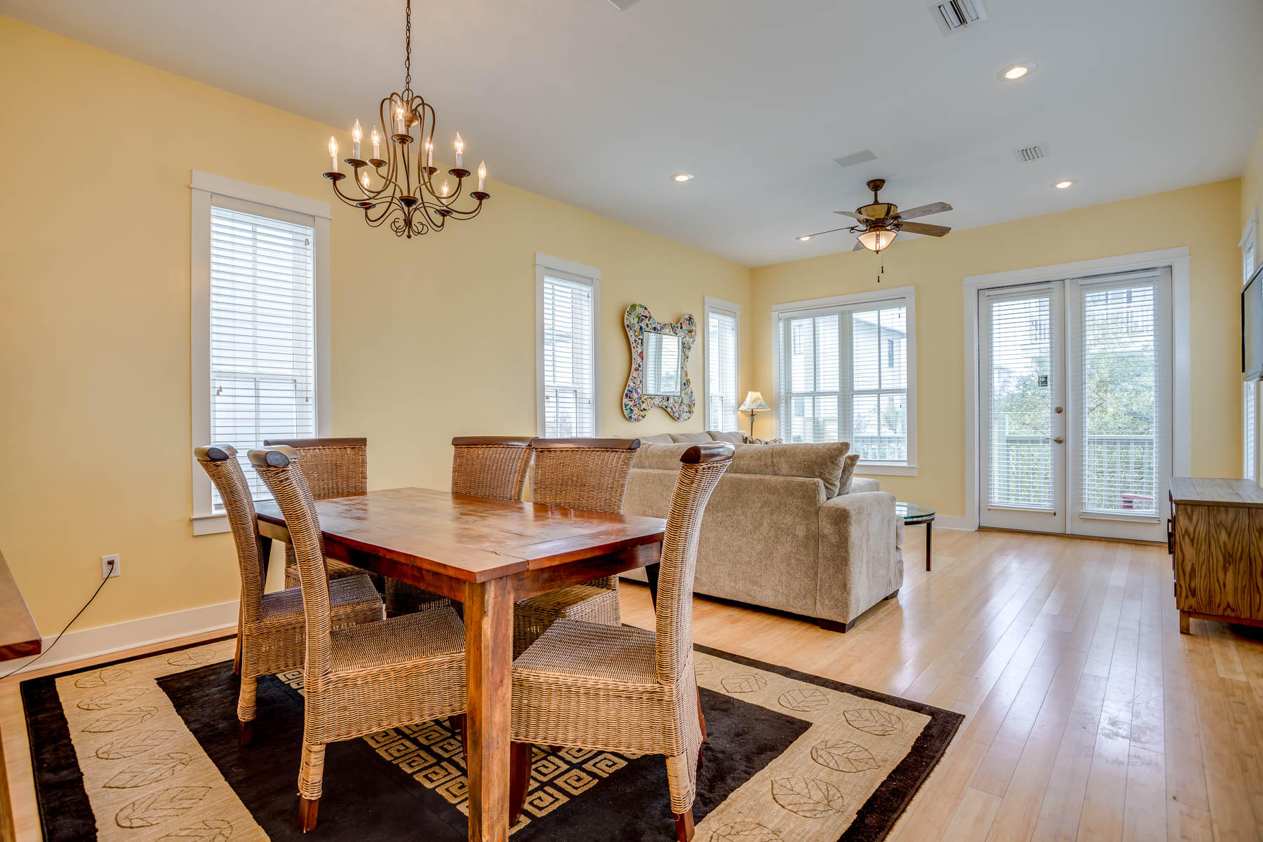 96 Chelsea Loop Road Santa Rosa Beach, FL 32459 - Photo 15 of 26 a view of a dining room with furniture a chandelier and wooden floor